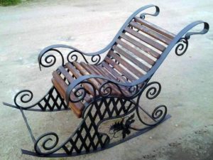 Фотография товара Кованое кресло качалка с декоративной решеткой