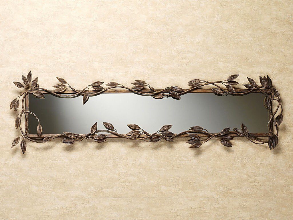 Фотография товара Кованая рамка для зеркала украшена листьями