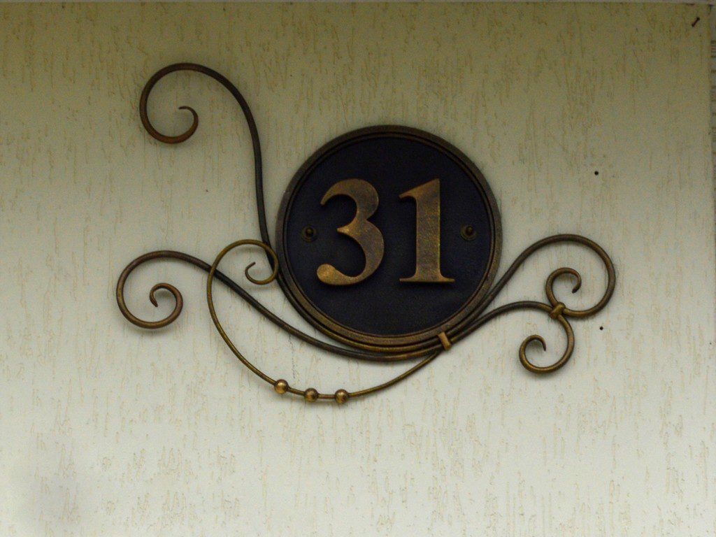 Фотография товара Кованая табличка с номером частного дома