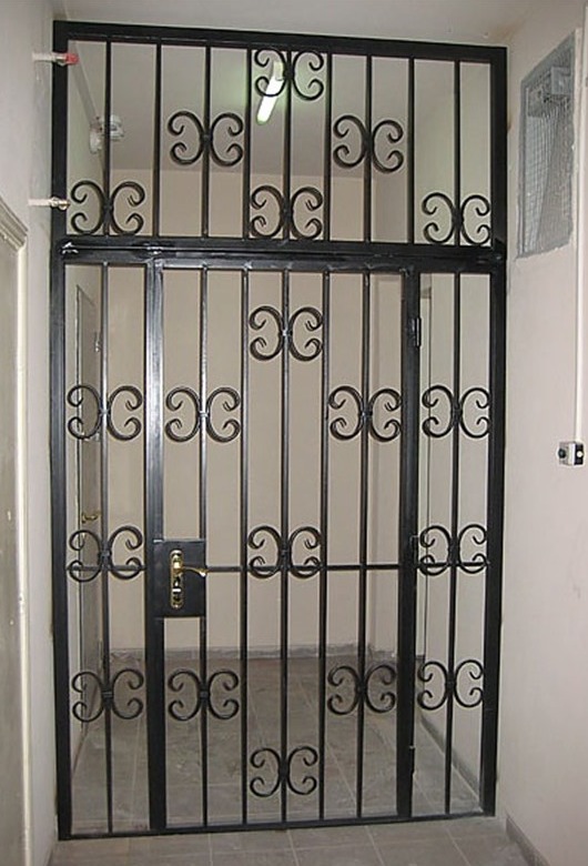 Фотография товара Кованая решетка на дверь №1