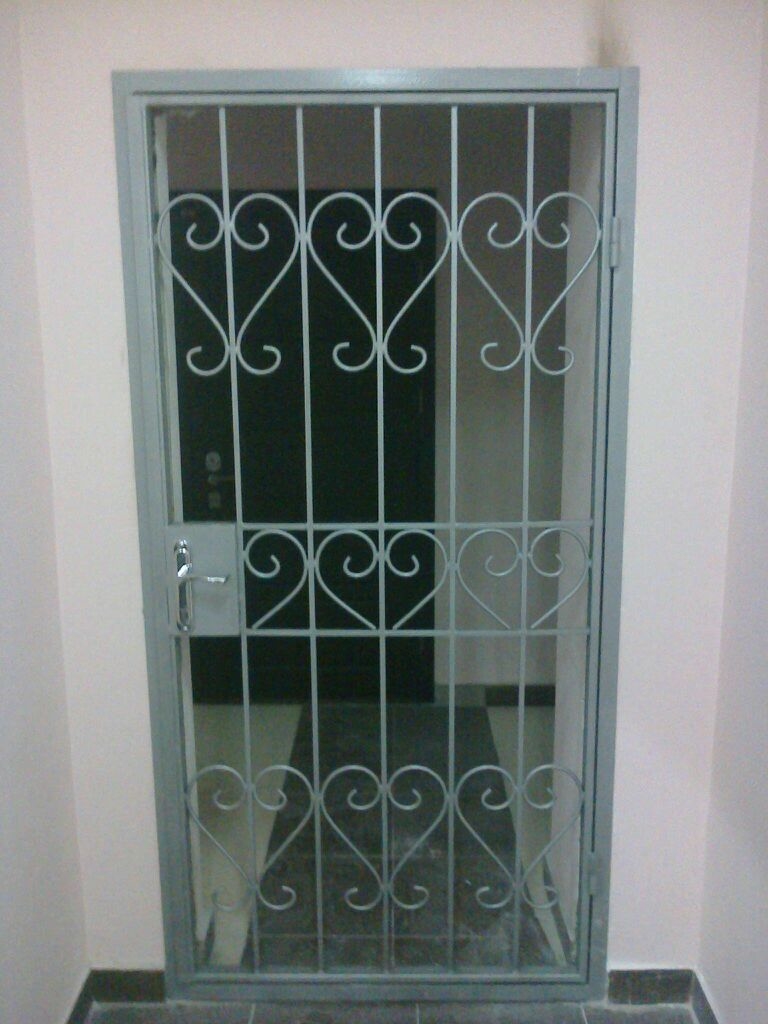 Фотография товара Кованая решетка на дверь сердце