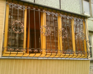 Фотография товара Кованая решетка на балкон с декоративными элементами №12