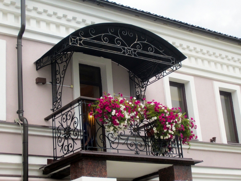 Фотография товара Стильный кованый балкон дома